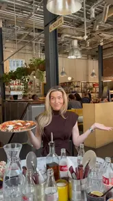 The video features a creator humorously documenting her 'healthy' week by showcasing the various lunches she actually ate at different venues in Leeds from Monday to Thursday, including pizza, tacos, a burger, and a steak sandwich.