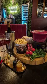 A promotional reel for a bottomless brunch at The Residence, featuring cheese fondue, steak, and prosecco.