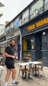 A short vlog-style review of Taco Nopal in Cheltenham, featuring the creator trying various tacos and a drink, highlighting the casual atmosphere and affordable pricing.