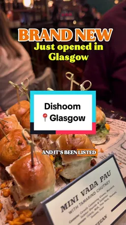 Din diners enjoying dishes at Dishoom, a popular new restaurant in Glasgow, attracting food enthusiasts.
