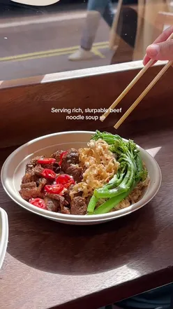 Delicious beef noodle soup, bao, and mango shaved ice at Kungfu Mama in Covent Garden, London.