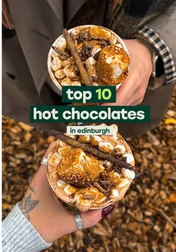 Delicious hot chocolate served with festive treats in Edinburgh, perfect for the winter season.