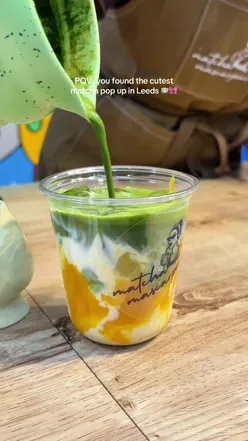 Delicious banana pudding matcha from a pop-up at Leeds Kirkgate Market, promoting local food scenes and flavors.