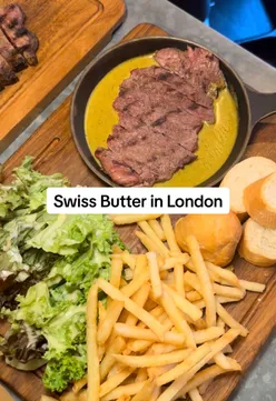 Delicious molten chocolate dessert with vanilla ice cream at Swiss Butter, London, showcasing their delightful desserts.