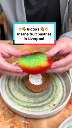 Delicious fruit pastries from Victor's Sweet Delights in Liverpool, featuring vibrant colors and tempting flavors.