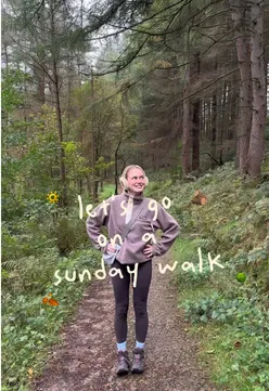 Enjoying a scenic autumn walk in Macclesfield Forest with hot chocolate and nature vibes.