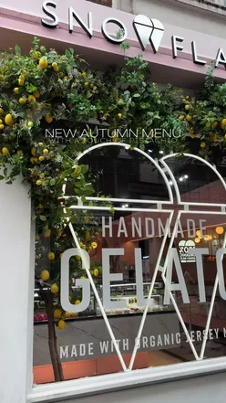 Enjoying autumn pistachio desserts at Snowflake Gelato in Soho, a perfect cozy treat for the season.