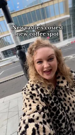 Cozy coffee shop The Book Club inside Newcastle City Library, perfect for coffee and lunch in the city center.