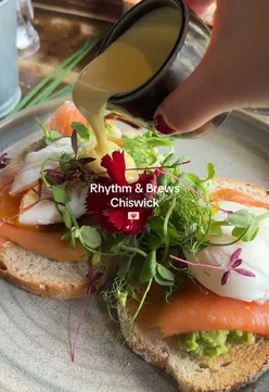 Brunch at Rhythm & Brews Cafe in Chiswick with eggs royale, prosecco, and vibrant music memorabilia.