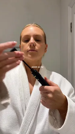 Vlogger tracking daily spending in London during Vlogmas, showcasing festive city life and holiday shopping.