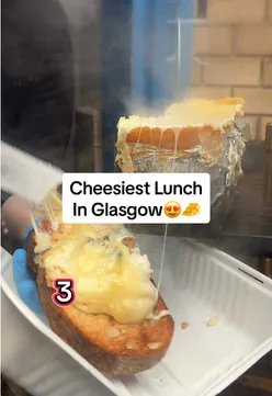 Cheese Box Glasgow: cozy police box eatery serving baguettes, toasties, cheesecake, and hot chocolate.