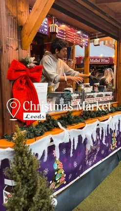 Delicious festive treats at Leeds Christmas Market, featuring hot chocolate, pastries, and warm crumbles.