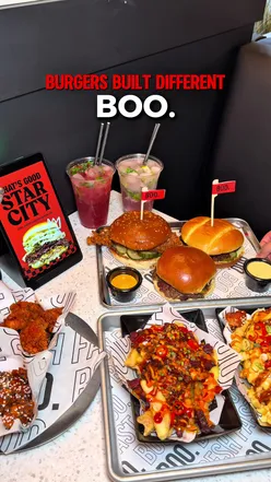 New Boo Burger in Birmingham with a variety of gourmet burgers, loaded fries, and refreshing mojitos on display.