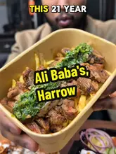 Diners enjoying a smash burger, chicken and rice, steak and chips, and a Taka Taka box at The Alibabas in Harrow.
