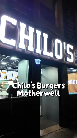 Chilos 🍔 We have been eyeing up Chilos since it opened in Motherwell last October and we're kindly invited down to try some of their meals and they did not disappoint!  The actual shop itself is really bright, the decor is very cool and there is seating available if you want to eat there which some people were doing! It was a Friday night and I will say this place was so busy. The amount of people in ordering and deliveries going out was insane and the staff were still super helpful and friendly - they said our order would take half an hour but we were out in 20mins. The food was super tasty, it all tasted very fresh and they had such a good selection.  What we ordered: Double Stack Cheeseburger  Kentucky Chicken Strips  Peri Peri Ziggy Fries Plain Ziggy Fries Mozzarella Sticks  All the dips 😂 AD | Gifted  #chilos #burgers #motherwell #lanarkshirefood #foodvlogger 🔍 Chilos | Motherwell Takeaways | Lanarkshire Food | Burger Restaurant | Friday Night Takeaway | @Chilo's Burgers 