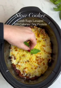 High protein meals that don’t taste healthy. Episode 13: Slow Cooker Lamb Ragu Lasagne Rich, slow cooked lamb, creamy cheesy layers and 56g protein per serving! 💪 Pure comfort food energy with zero “diet” vibes. Save this for your next cosy dinner! Nutrition ⬇️ Per serving  Calories - 559, Fat - 16.2g, S/Fat - 6.3g, Carbs - 47.4g, Sugar - 13.9g, Protein - 56g  Ingredients ⬇️ Serves 4  Lamb Ragu: 550g Extra Lean Diced Leg Of Lamb, or lamb steaks, fat trimmed  1 Onion, Finely Diced 2 Medium Carrots, Finely Diced 2 Celery Sticks, Finely Diced 3 Garlic Cloves, Minced  1 Tbsp Tomato Purée 400g Chopped Tomatoes 1 Tsp Dried Oregano 1 Tsp Dried Parsley 1 Tsp Paprika 150ml Beef Stock Salt And Black Pepper Lasagne Layers: 170g Dried Lasagne Sheets Topping: 220g Dolmio Light Creamy Lasagne Sauce 25g Mozzarella, Grated 25g Reduced Fat Cheddar, Grated Fresh Basil Leaves, To Finish Serve with: Mixed Leaf Salad  Method ⬇️ Heat a non stick frying pan over medium high heat. Add the diced lamb in batches and cook until browned on all sides. Transfer the lamb to the slow cooker. Add the onion, carrots, celery, garlic, tomato purée, chopped tomatoes, oregano, parsley, paprika and beef stock to the slow cooker. Stir well to combine and season with salt and black pepper. Cook on LOW for 7-8 hours or HIGH for 4-5 hours until the lamb is very tender. For the final 30 minutes, leave the slow cooker lid off to allow the ragu to thicken and reduce. Taste and adjust seasoning if needed. Break each lasagne sheet into three roughly equal pieces and push them into the ragu so they are mostly submerged.  Spoon the Dolmio Light Creamy Lasagne Sauce evenly over the top & sprinkle over the mozzarella and reduced fat cheddar. Cover with the lid and cook on HIGH for 25-30 minutes, or until the pasta is fully tender. If desired, finish under a hot grill for a few minutes until the cheese is bubbling and lightly golden. Rest for 10 minutes and finish with fresh basil before serving. Serve with mixed leaf salad and enjoy!  #highproteinmeals #lowcaloriemeals #easyrecipes #highprotein #lasagne