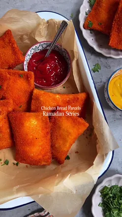 ✨Ramadan Recipes✨ Creamy Chicken Bread Parcels.       Ingredients - makes approx 25  For the Chicken Mixture: 1kg Chicken Breast - large mince  3/4 chopped/minced garlic  Salt to taste  1tbsp whole cumin seeds Green chillies to taste  1 cup sweetcorn  300g Philadelphia Cream Cheese 1 cup grated cheese Chopped coriander  To Assemble: White bread slices Flour Paste - plain flour mixed with water Breadcrumbs Whisked eggs Method 1.In a pan add the chicken mince and cook until the water evaporates. 2Add all spices and sweetcorn - cook for a few minutes. 3.Add the Philadelphia cream cheese, grated cheese and chopped coriander - mix well. 4.Make the flour paste. 5.Roll the bread slices until thin, cut off the edges - add the chicken mix to one side of the bread. Fold over and close with the flour paste. You can use a form to close the edges. 6.Dip in egg and breadcrumbs. 7.Deep fry/Air fry or freeze at this stage. #breadrolls #ramadanrecipes #ramadan #easyrecipes #iftar  