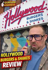 The creator visits 'Hollywood Burgers & Shakes' in Manchester, providing a direct review of the venue's interior and a taste test of their burger, wings, mozzarella sticks, and milkshake while eating in their car.