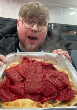 Delicious meal at Darjeeling Walkden featuring vibrant dishes and joyful diners enjoying a trendy food experience.