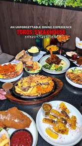 A promotional reel for Toros Steakhouse featuring a wide array of dishes including steaks, ribs, pasta, and mocktails, set against the backdrop of the restaurant's interior.
