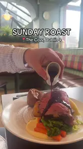 A personal review of a Sunday roast experience at The Cow in Dublin, featuring shots of the exterior, interior, menu, and various dishes including the roast, sides, and dessert.