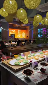 A vibrant showcase of a hotpot and sushi restaurant in Manchester, highlighting the conveyor belt delivery system, interactive hotpot cooking, and fresh seafood selection.