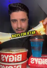 A mukbang-style food review featuring a creator eating a burger, a cheese-filled snack, and a rice bowl from Bigys.