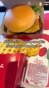 A short, handheld-style video documenting the opening of the first Chick-fil-A location in London. The video captures the exterior queue, the interior atmosphere, and a close-up of the food, providing a quick, informative update for viewers interested in the new venue.