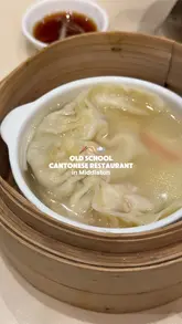 A montage-style video showcasing various Cantonese dishes at Ocean Treasure Seafood Restaurant in Middleton. The video features close-up shots of dim sum, steamed rice rolls, deep-fried oysters, and roast meats, interspersed with brief glimpses of the restaurant's interior. The video uses text overlays to identify the dishes and the restaurant's location.