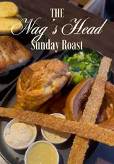 A short review of a Sunday roast at The Nag's Head in Brentwood, featuring a sharing platter with beef, chicken, and pork belly.