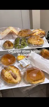 A couple visits Chinatown Bakery in London, highlighting its popularity, affordability, and wide selection of Asian baked goods. They taste-test several items, including roast pork buns, custard taiyaki, and matcha oreo buns, providing positive feedback on the taste and texture.