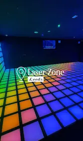 A promotional video for Laser Zone in Leeds, featuring clips of the laser tag arena, a light-up floor game called Grid Rush, arcade bowling, and a slushie machine.
