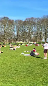A montage of clips showing people enjoying a sunny day in Hyde Park, Leeds, featuring sunbathing, walking, and general park activities.