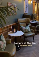A couple visits Bonnar's, a restaurant located within The Scott Hotel in Edinburgh, showcasing the interior, cocktails, and a variety of dishes from their menu.