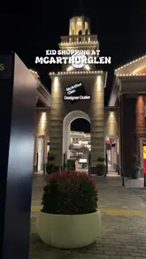 A creator visits McArthurGlen Designer Outlet to showcase the shopping experience and festive atmosphere for Eid, highlighting various stores and a food stall.