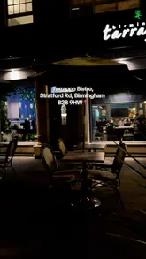 A montage-style video showcasing the interior and various dishes at Tarragon Bistro in Birmingham, including steak, desserts, and mocktails.
