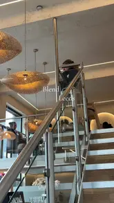 A short, music-led montage showcasing the interior and food offerings at Blend in Leeds, featuring close-ups of coffee, a full breakfast plate, and pancakes.