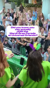 A creator documents their experience riding on a float during the Mardi Gras parade at Universal Orlando, highlighting the excitement of throwing beads to the crowd and the overall atmosphere of the event.