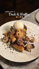 A promotional reel for 'Waffle Week' at Duck & Waffle, featuring a variety of sweet and savoury waffle-based dishes, cocktails, and the restaurant's signature skyline views.
