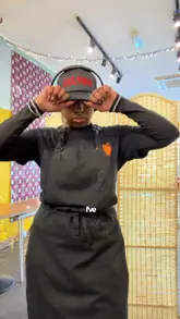The creator demonstrates how to make a vegan version of the traditional Bajan dish 'Souse' using green plantains. The video follows her through the preparation process, from peeling the plantains to chopping vegetables and mixing the ingredients, while she explains the cultural significance of the dish and her motivation for creating a vegan alternative.