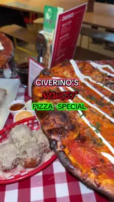 A short, punchy food review video showcasing a collaboration pizza special, giant mozzarella sticks, and mac and cheese balls at Civerinos. The video focuses on close-up shots of the food, including cheese pulls and dipping, to highlight the textures and appeal of the dishes.