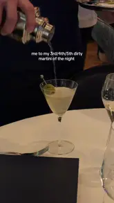 A short, handheld clip capturing a dirty martini being poured at The Langham in London, accompanied by a humorous text overlay about the number of drinks consumed.