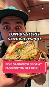 A high-energy, creator-led review of 'My Favourite Sandwich' at Paddington Station, showcasing their range of sandwiches, pastries, and coffee. The video features quick cuts, close-ups of food preparation, and the creator's enthusiastic reaction to the menu items.