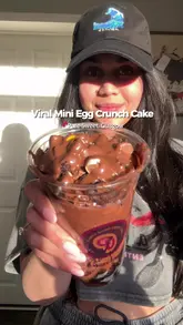A creator reviews a selection of indulgent desserts from a drive-thru dessert spot in Glasgow, showcasing items like a Mini Egg Crunch Cake, Creme Egg Cookie Dough, and a Nutella Bubble Waffle.