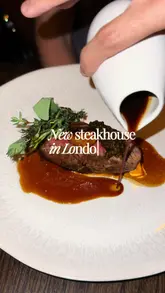 A high-quality montage of dishes and interior shots at Cooper's Cut, a new steakhouse located at the Four Seasons. The video features close-ups of plating, sauce pouring, and specific menu items like wagyu beef with caviar and tarte tatin.