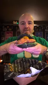 A review of Phat Bastrd Burger's residency at The Botanic Inn in Belfast, featuring close-ups of their loaded fries and signature burgers.