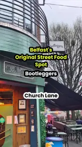 A creator visits Bootleggers in Belfast, providing a tour of the venue and a review of their street food menu, including burgers, tacos, nachos, and cocktails.