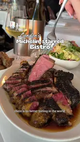 A video review of Dorian, a Michelin-starred restaurant in London. The creator documents their lunch experience, highlighting the open kitchen, the quality of the ingredients, and specific dishes like the bone-in rib eye, beef tartare, and chilli tiramisu. The video combines shots of the food preparation, the interior, and the dining experience.