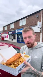 A casual, handheld food review of a local takeaway shop called Silver Cod in Norton, where the creator samples their fish and chips and a takeaway pizza.