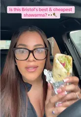 A food review video featuring a creator visiting a street food venue in Bristol to test their shawarma wrap. The video includes a direct-to-camera review, shots of the food preparation, and a final verdict on the quality and value.